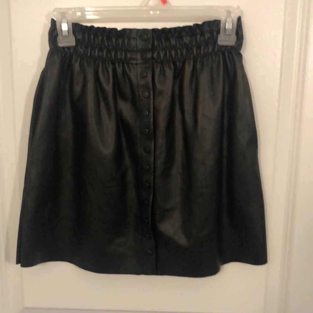 Black leather mini skirt